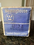Nos Vintage Westinghouse Amber-yellow Fog Light Bulb 5-3/4" Dia. 6 Volt 4012A New. Price: $75.00.